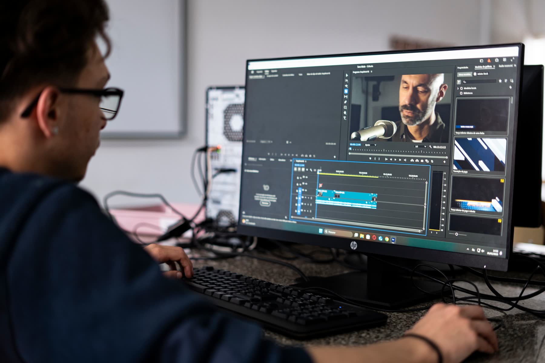 Video editor working on a YouTube edit in Premiere Pro